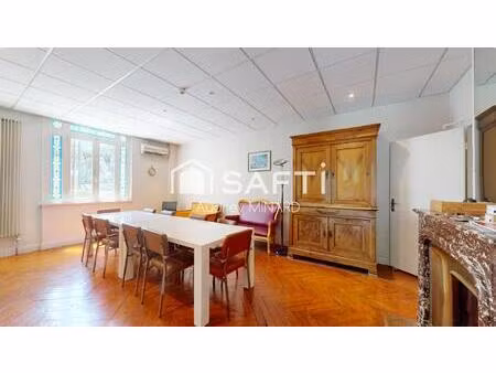 immeuble en pierre de 340 m2 avec parc arboré au coeur de léognan