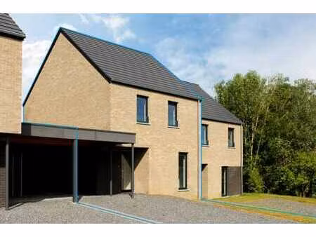 a vendre  maison neuve  3 chambres avec un beau jardin