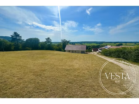 10 min de saint vit - terrain constructible viabilisé