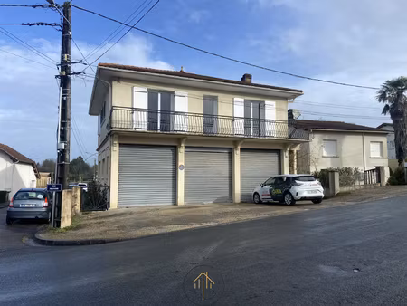 maison sur trois garages à chalais