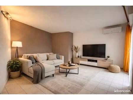 appartement t2 60m2 - climatisation - ascenseur - centre ville - terrasse - garage - cave 