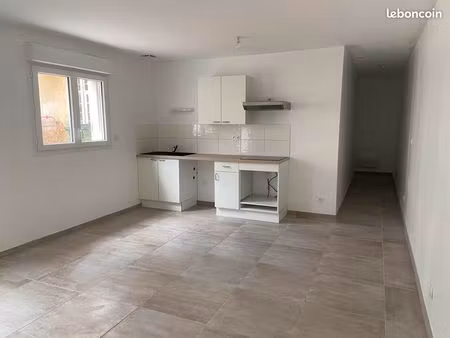 t1 rdc avec place de parking