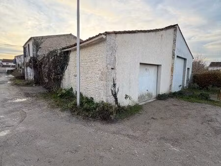bâtisse pour garage ou projet immobilier
