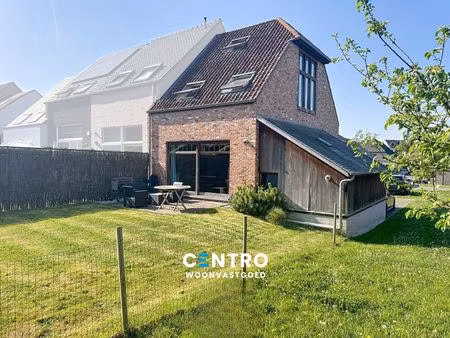 leuke woning met alle comfort met 3 slpks  garage en zuidger. tuin!