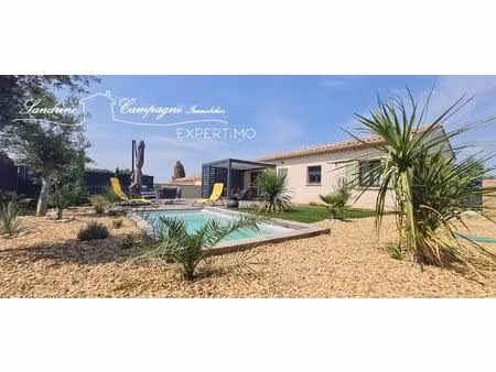 villa t4 non mitoyenne de plain pied  sur parcelle paysagee piscinee