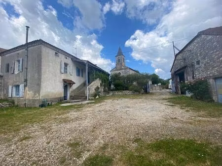 maison de village en pierre avec grange et appenti en pierre