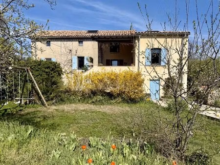 belle maison familiale en pierre sur 1 500 m2 de terrain constructible à ucel