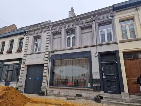 immeuble de rapport de 4 app. 1 commerce à ath