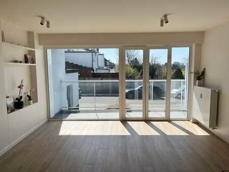 appt 70 m² 1ch + bureau  parking  jardin. proximité gare.