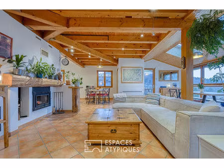 duplex rénové avec jardin et terrasse ombragée vue sur le lac