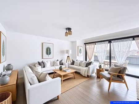 buitengewoon ruim appartement met open zicht  parking inhuis en multifunctionele zolderrui