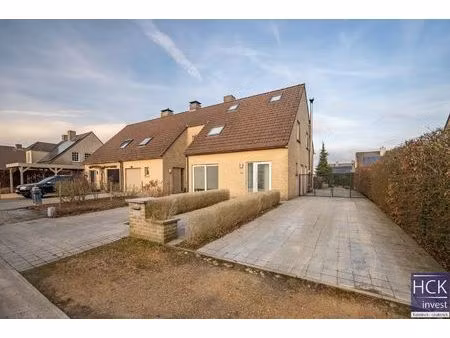 kruishoutem - instapklare halfopen bebouwing op uiterst rustige ligging!