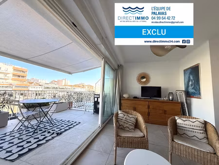 f2 traversant rénové avec grande terrasse vue canal