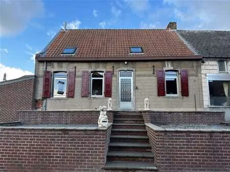 charmante maison à rénover avec jardin agréable!