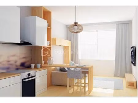 charmant pied-à-terre à vendre dans le quartier prisé d'une ville dynamique