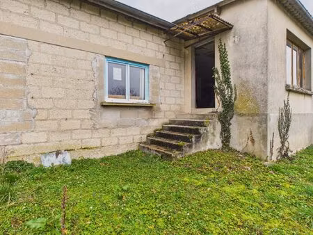 terrain à bâtir avec garage et remise