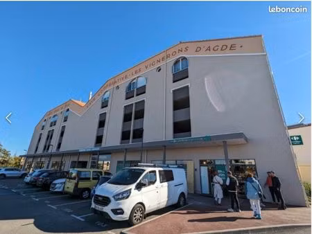 loue place de parking couvert dans résidence avec bip
