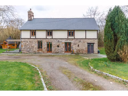 manche ; maison de campagne de 4 chambres avec garage  dépendances et jardin.