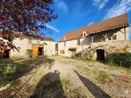 ensemble en pierre composé d'une maison avec studio indépendant et une grange