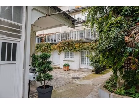 75017 - rue de levis - 3 pieces - 2 chambres - loft sur cour arboree