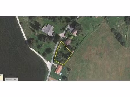 terrain à bâtir dans quartier calme de saint-priest-les-fougères