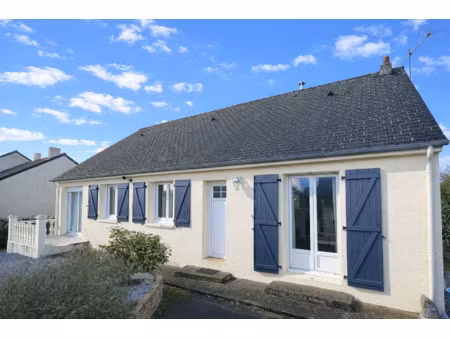 maison de plain-pied avec jardin.