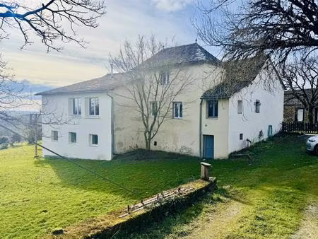 la salvetat-peyralès – maison en pierre avec granges sur 6 16 ha