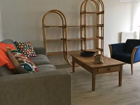 appartement 34 m² meublé avec place de parking et vue sur jardin – quartier madeleine