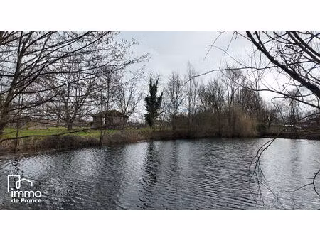 terrain avec étangs 5752 m² - bresse vallons (cras-sur-reyssouze)