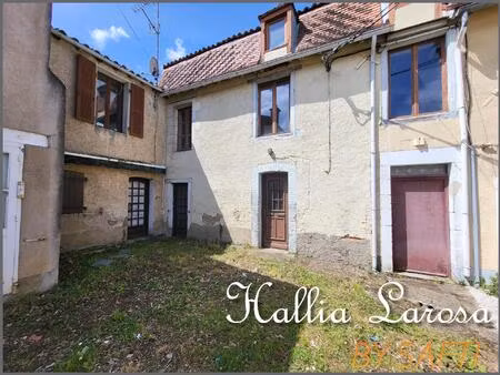 ensemble immobilier avec garage et jardin