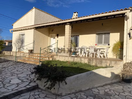 maison de plain pied de 95 m2  avec garage  sur parcelle de