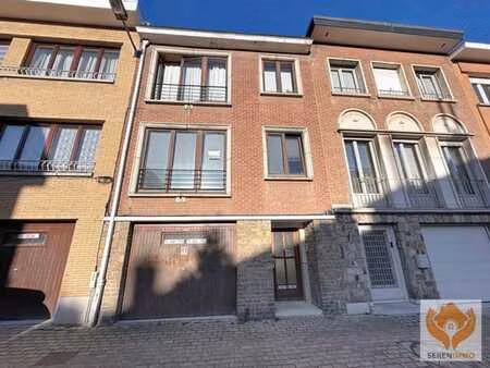 immeuble de rapport avec 2 appartements garage et jardin