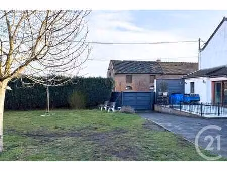 maison 3 façades avec grands volumes  jardin et garages