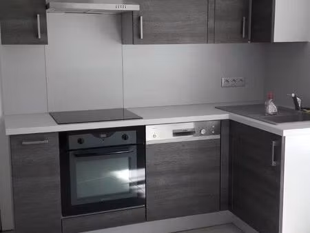 appartement t2 61m² centre ville dans petite copropriété avec garage et terrasse