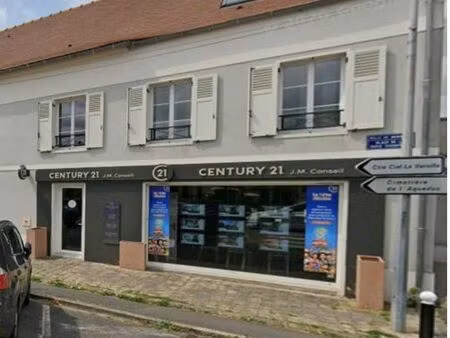 murs local commercial loué a vendre