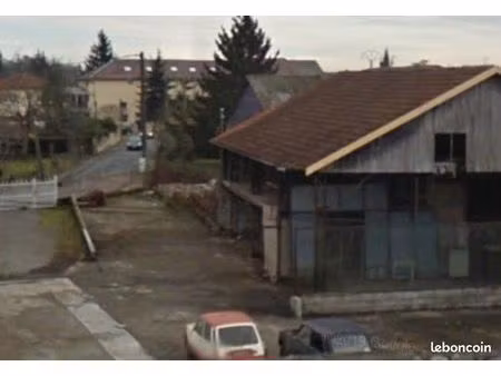 terrain 900 m² + local sinistré