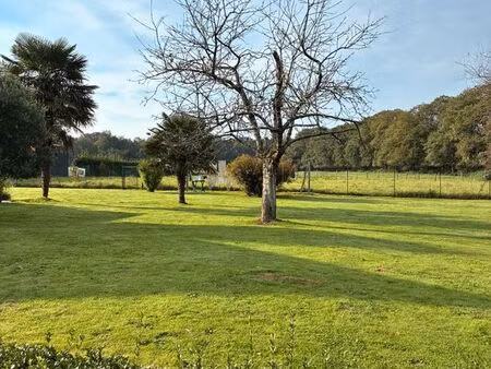 hangard avec terrain constructible