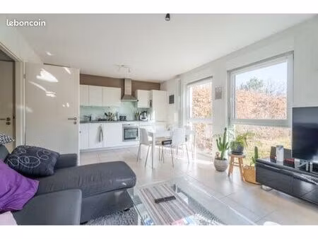 appartement 2 pièces 50 m² - en rez-de-jardin privatif de 205 m²