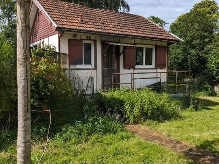 petit chalet aménagé sur 752 m² – village du vexin (site classé)