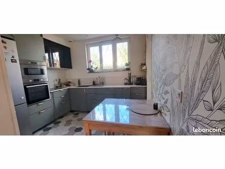 maison dans parc privé