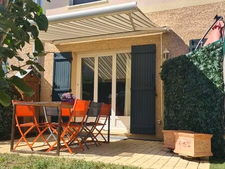 duplex lumineux de 128 m² avec jardin privatif  garage  place de parking et cave