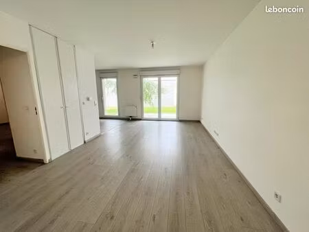 a saisir_ apt_ 65m2_ etat impeccable avec jardin  terrasse  box  parking