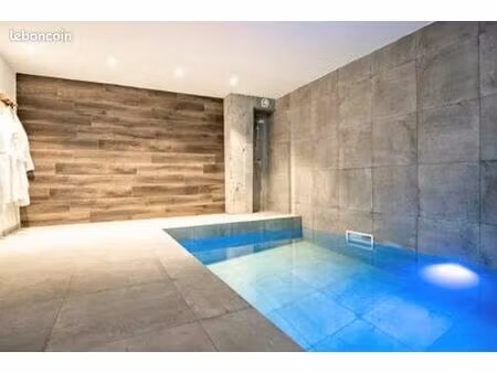 appartement ski aux pieds de 190 m² – piscine intérieure privative – terrasse plein sud – 