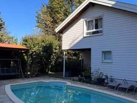 propriété rare (2 maisons  piscine et garages)