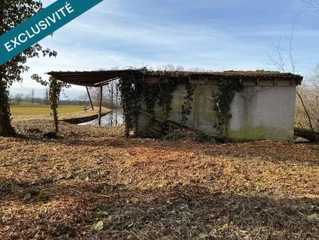 etang fondé en titre chalet en dur  22000m² de surface.