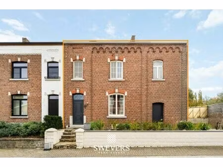 gezellige woning met moderne keuken op groot perceel in gingelom