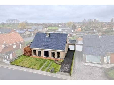 rustig gelegen woning met 3 slpks en garage op perceel van 585 m²!