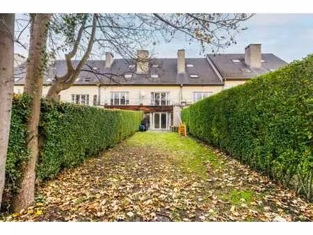 maison unifamiliale (3ch/3sdb/1bu/ch) garage et jardin