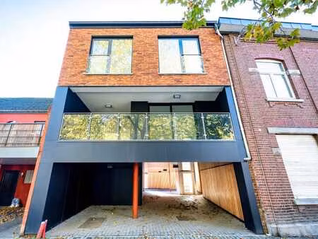 2 apparts neufs  terrasses  parkings au centre d'hermalle