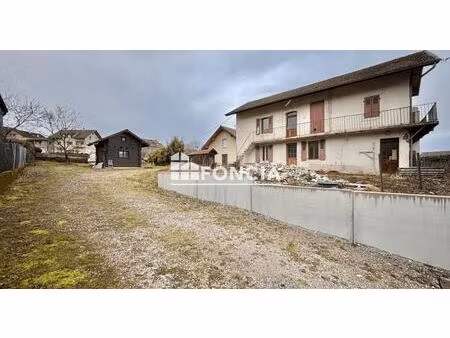 terrain de 1265m2 avec maison à rénover